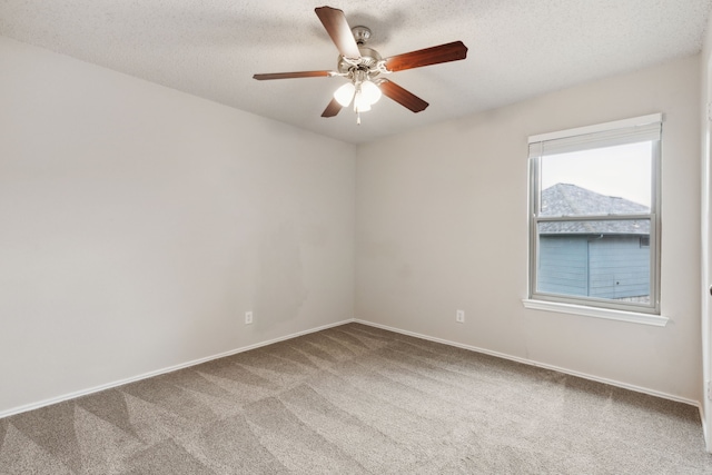 3516 Napolean Ct, Plano, TX 75023 - carpeted spare room with a ceiling fan, baseboards, and a textured ceiling