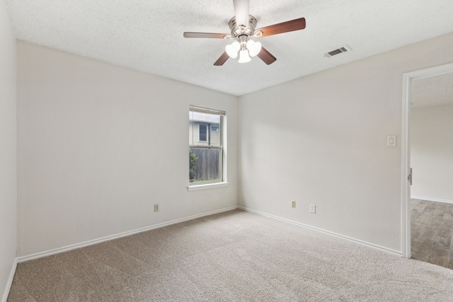3516 Napolean Ct, Plano, TX 75023 - carpeted spare room featuring a ceiling fan, baseboards, and a textured ceiling