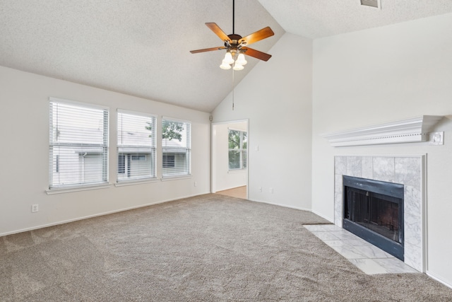 3516 Napolean Ct, Plano, TX 75023 - unfurnished living room with carpet, high vaulted ceiling, ceiling fan, a tile fireplace, and a textured ceiling