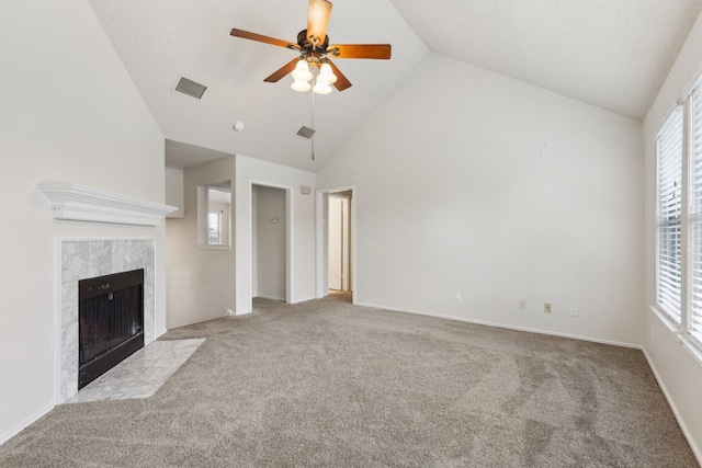 3516 Napolean Ct, Plano, TX 75023 - unfurnished living room featuring carpet floors, plenty of natural light, ceiling fan, a fireplace, and high vaulted ceiling