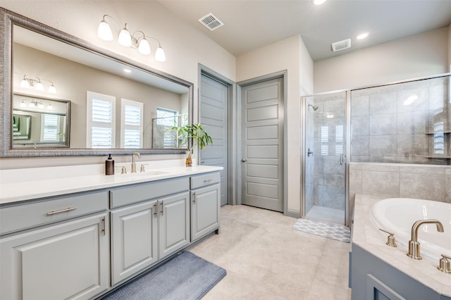 1930 Inwood Ln, Prosper, TX 75078 - bathroom with a shower stall, a bath, vanity, tile patterned flooring, and recessed lighting