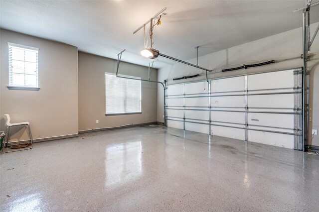 1930 Inwood Ln, Prosper, TX 75078 - garage featuring a garage door opener and baseboards