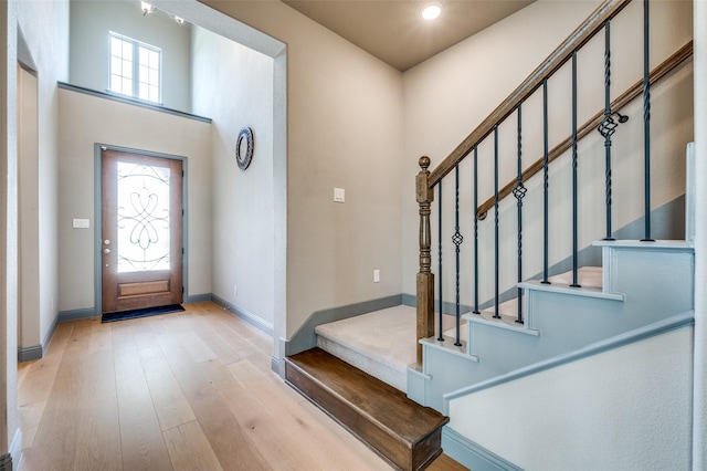 1930 Inwood Ln, Prosper, TX 75078 - foyer featuring baseboards, light wood finished floors, stairs, and recessed lighting