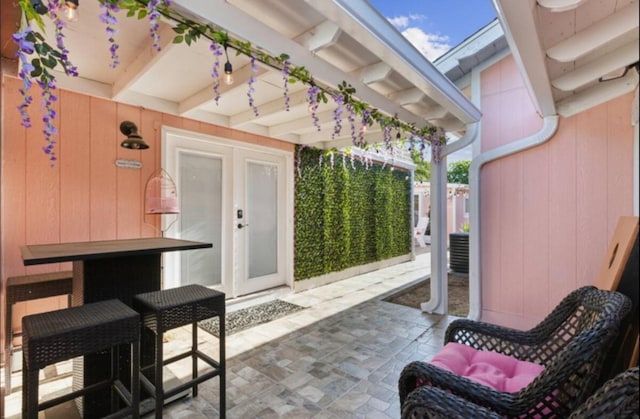 view of patio featuring french doors