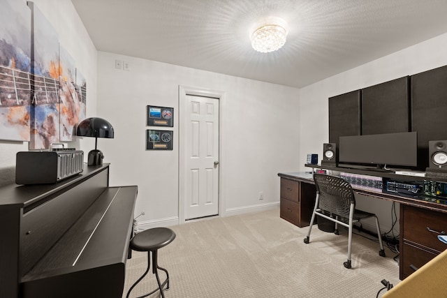 office area featuring light colored carpet, baseboards, and a chandelier