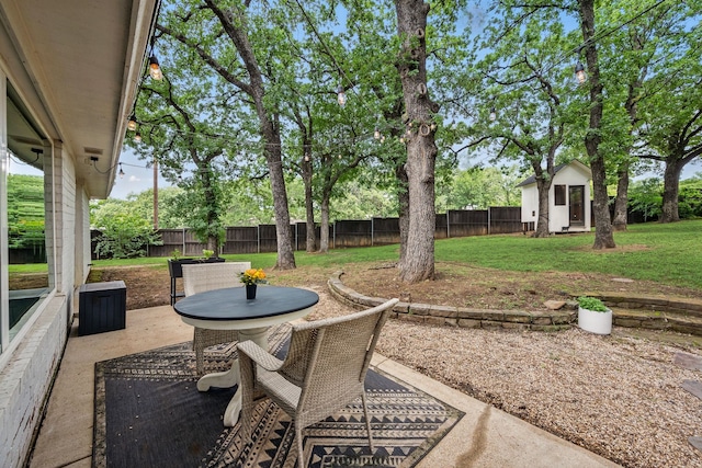 view of patio with an outdoor structure
