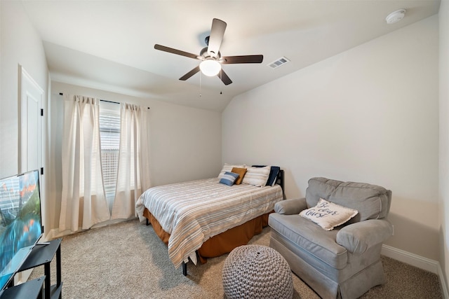 bedroom featuring light carpet, a ceiling fan, and vaulted ceiling