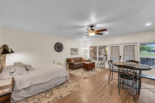 3601 Orchard Ln, Waco, TX 76705 - bedroom with wood finished floors, recessed lighting, and a ceiling fan