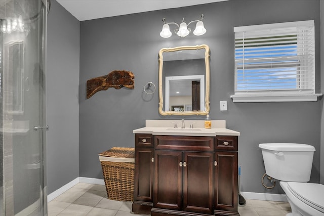 3601 Orchard Ln, Waco, TX 76705 - full bathroom with vanity, toilet, baseboards, and a shower with shower door