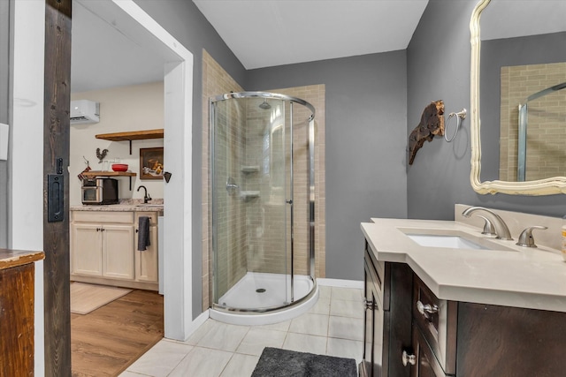 3601 Orchard Ln, Waco, TX 76705 - bathroom featuring vanity, a shower stall, and a wall unit AC