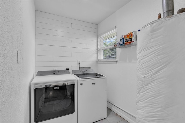 3601 Orchard Ln, Waco, TX 76705 - laundry area featuring washing machine and clothes dryer and wooden walls