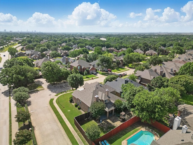 aerial view of residential area with a pool