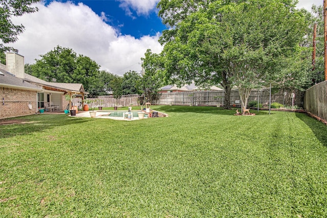 view of yard with a patio area