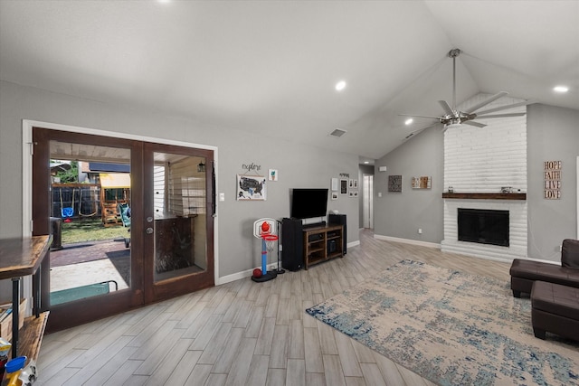 4677 Bracken Dr, Fort Worth, TX 76137 - living room with ceiling fan, vaulted ceiling, french doors, wood finished floors, and baseboards