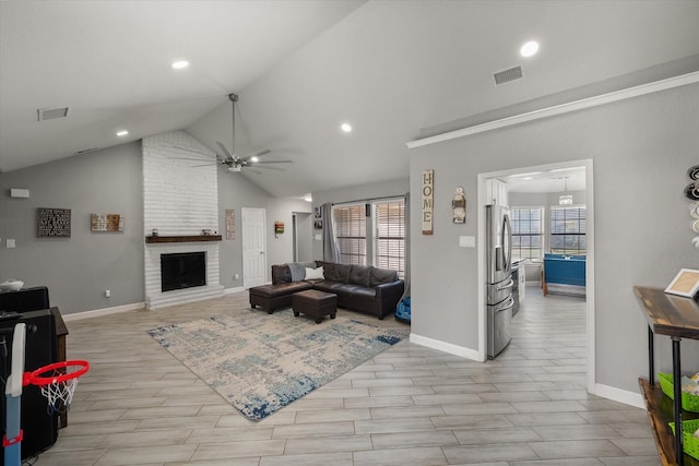 4677 Bracken Dr, Fort Worth, TX 76137 - living room featuring a ceiling fan, baseboards, a fireplace, light wood-type flooring, and recessed lighting