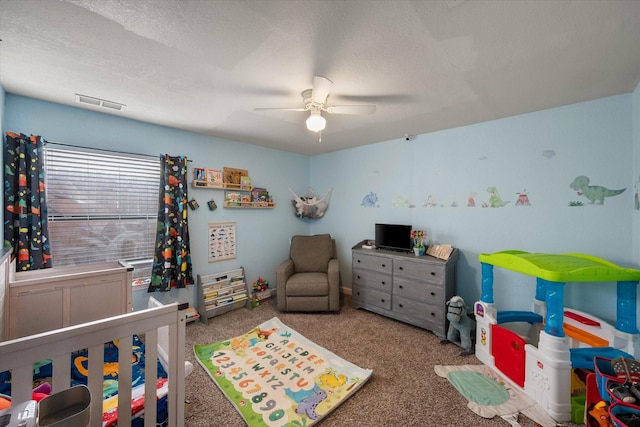 4677 Bracken Dr, Fort Worth, TX 76137 - bedroom with carpet, a textured ceiling, and ceiling fan