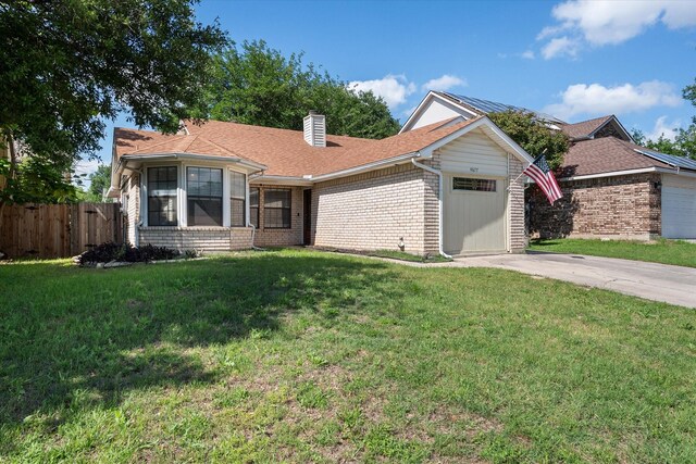 4677 Bracken Dr, Fort Worth, TX 76137 - single story home featuring a chimney, brick siding, driveway, and an attached garage