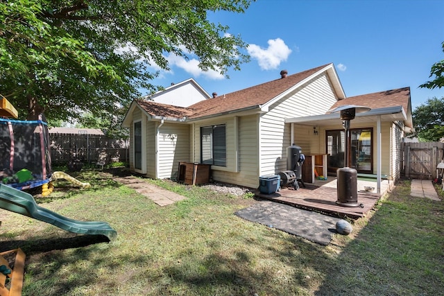 4677 Bracken Dr, Fort Worth, TX 76137 - rear view of house with a playground, a patio area, a gate, and a shingled roof