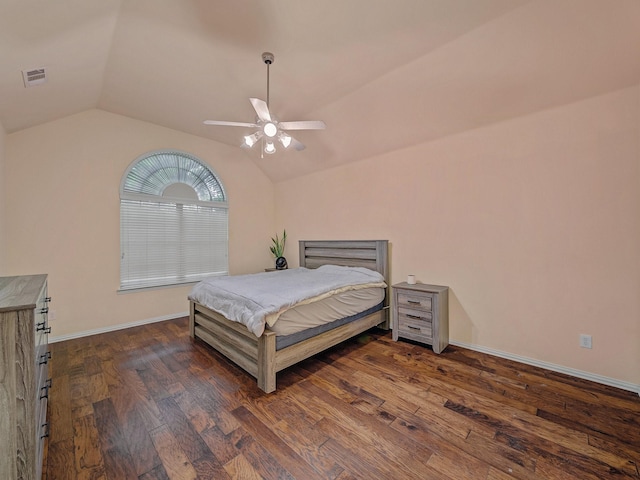 8431 Firewheel Ln, Frisco, TX 75036 - bedroom featuring lofted ceiling, dark wood-type flooring, baseboards, and a ceiling fan