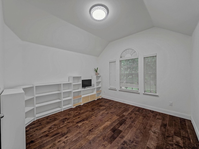 8431 Firewheel Ln, Frisco, TX 75036 - additional living space featuring vaulted ceiling, dark wood finished floors, and baseboards