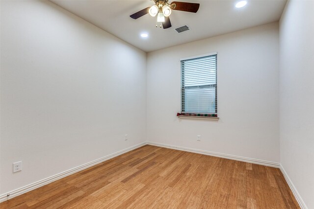 unfurnished room featuring light wood-style flooring, ceiling fan, baseboards, and recessed lighting
