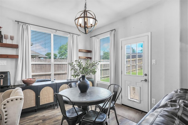 2812 Arabian Ln, Celina, TX 75009 - dining area featuring a chandelier and wood finished floors