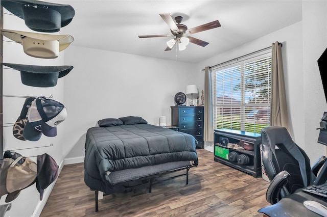 2812 Arabian Ln, Celina, TX 75009 - bedroom with wood finished floors, a ceiling fan, and baseboards