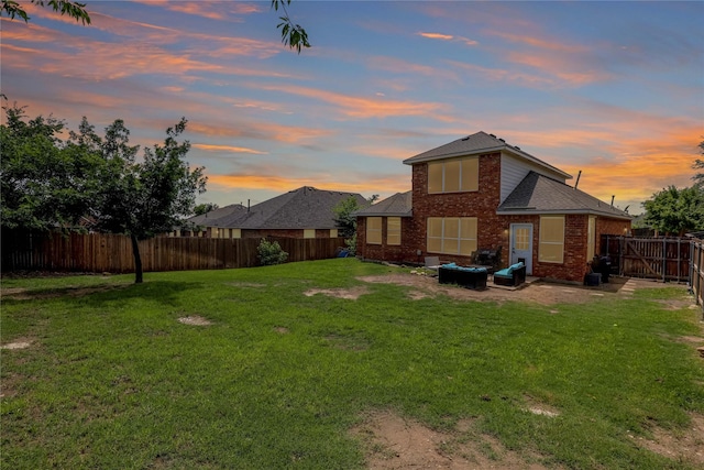 2812 Arabian Ln, Celina, TX 75009 - back of property at dusk with brick siding and a shingled roof