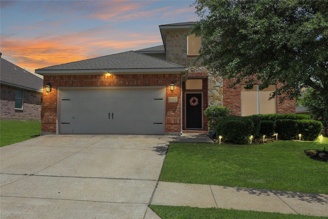 2812 Arabian Ln, Celina, TX 75009 - view of front of property featuring a lawn, an attached garage, driveway, brick siding, and a shingled roof