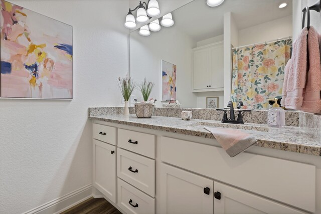 164 Vz County Road 2433, Canton, TX 75103 - bathroom with wood finished floors, vanity, baseboards, and a shower with curtain