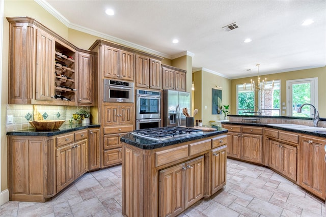 1900 Pembroke Ln, Mckinney, TX 75072 - kitchen with a sink, stainless steel appliances, stone tile floors, dark countertops, and a kitchen island
