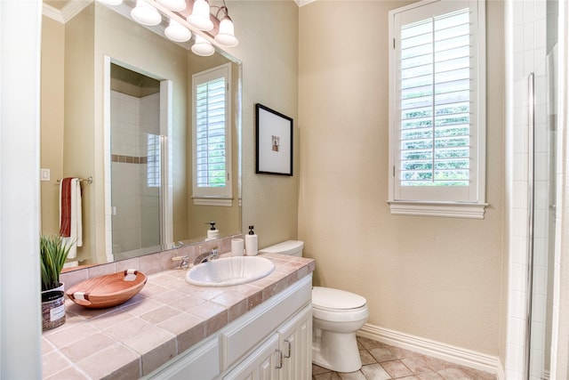1900 Pembroke Ln, Mckinney, TX 75072 - full bath with toilet, healthy amount of natural light, vanity, and baseboards