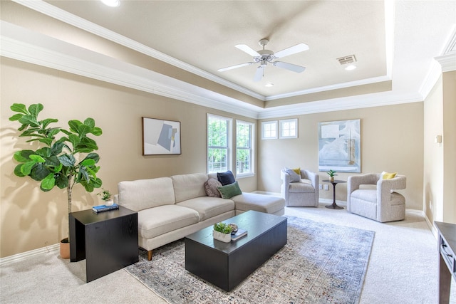 1900 Pembroke Ln, Mckinney, TX 75072 - carpeted living room featuring ceiling fan, ornamental molding, a raised ceiling, baseboards, and recessed lighting