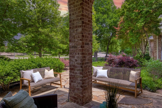 1900 Pembroke Ln, Mckinney, TX 75072 - patio terrace at dusk featuring a patio area and an outdoor hangout area