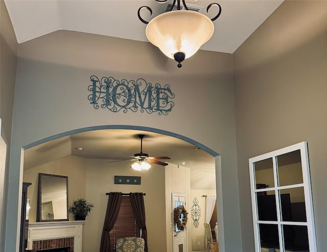 10159 English Oaks Dr, Keithville, LA 71047 - detailed view of ceiling fan, a fireplace, and arched walkways