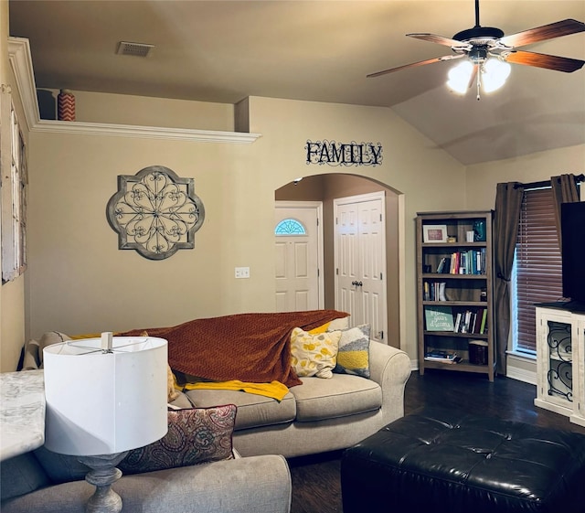 10159 English Oaks Dr, Keithville, LA 71047 - living room featuring a ceiling fan, arched walkways, and vaulted ceiling