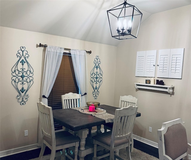 10159 English Oaks Dr, Keithville, LA 71047 - dining space featuring vaulted ceiling, baseboards, and a chandelier