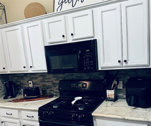 10159 English Oaks Dr, Keithville, LA 71047 - kitchen with black appliances, tasteful backsplash, and white cabinetry