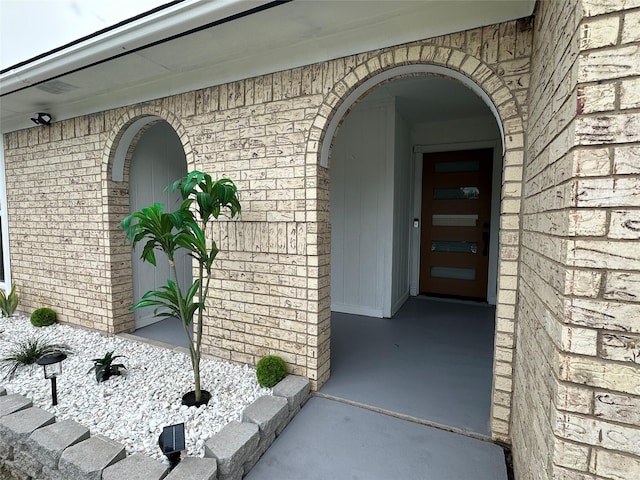 7501 Echo Hill Dr, Watauga, TX 76148 - view of exterior entry featuring brick siding