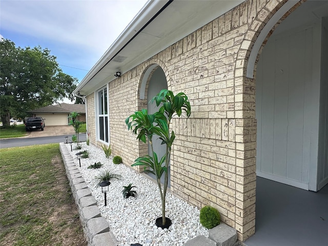 7501 Echo Hill Dr, Watauga, TX 76148 - view of side of home featuring brick siding