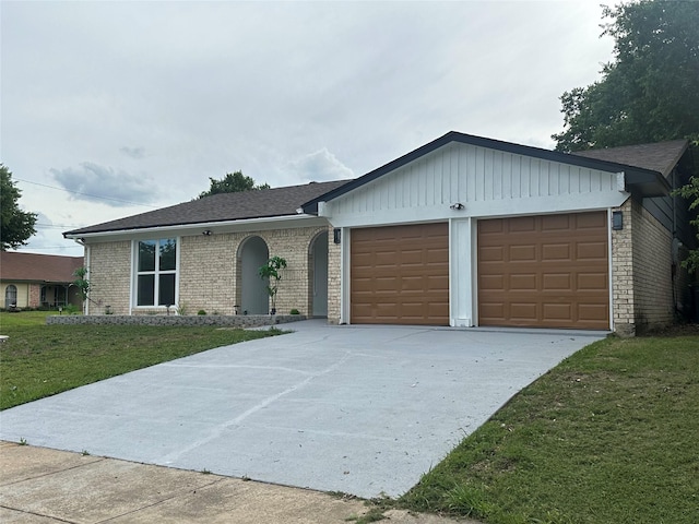 7501 Echo Hill Dr, Watauga, TX 76148 - ranch-style home with a garage, concrete driveway, a front lawn, brick siding, and roof with shingles