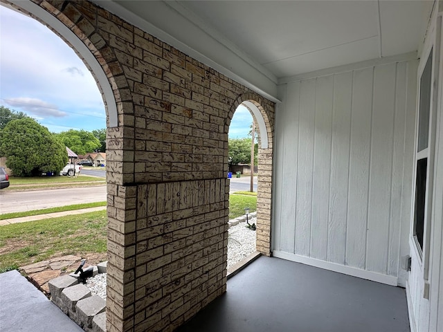 7501 Echo Hill Dr, Watauga, TX 76148 - detailed view of brick siding, arched walkways, and stone siding
