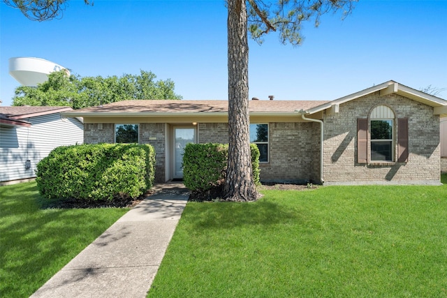 921 Meadow Mead Dr, Allen, TX 75002 - single story home featuring a front yard, brick siding, and a shingled roof