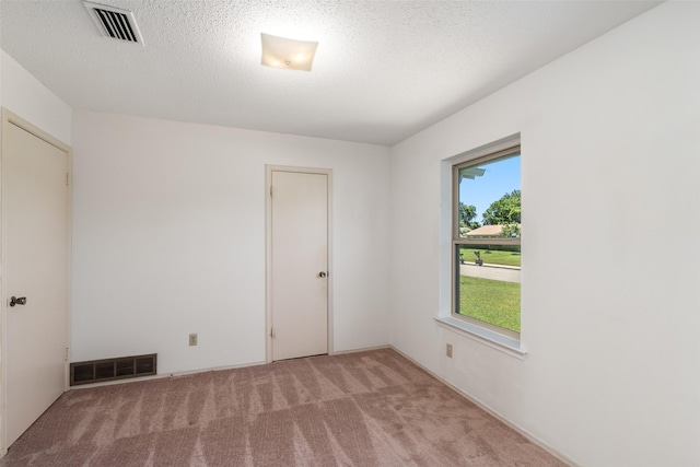 921 Meadow Mead Dr, Allen, TX 75002 - unfurnished room featuring light carpet and a textured ceiling