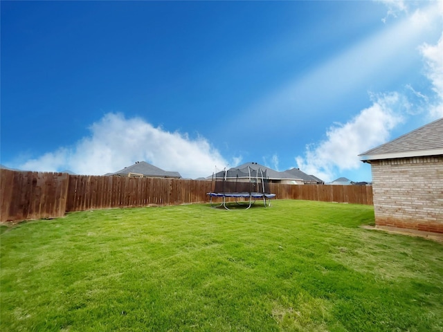 7415 Morning Glory Rd, Abilene, TX 79602 - view of yard featuring a trampoline