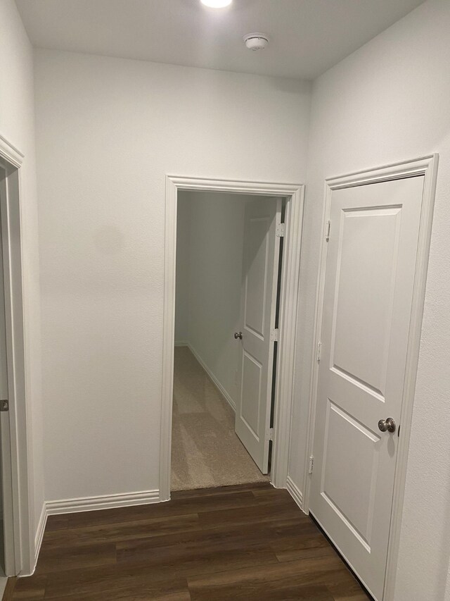 1613 Pine Valley Dr, Fort Worth, TX 76052 - hallway with dark wood-style floors and baseboards