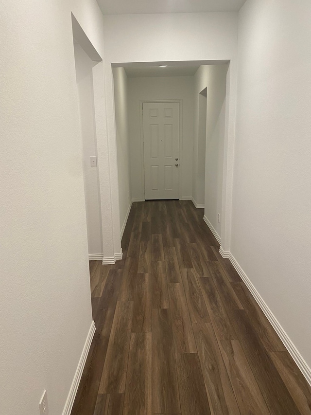 1613 Pine Valley Dr, Fort Worth, TX 76052 - hall with dark wood finished floors and baseboards