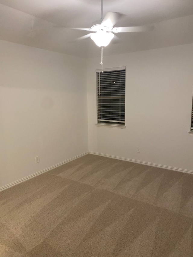1613 Pine Valley Dr, Fort Worth, TX 76052 - carpeted empty room featuring a ceiling fan and baseboards