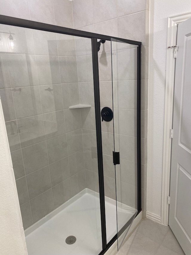 1613 Pine Valley Dr, Fort Worth, TX 76052 - bathroom featuring a shower stall and tile patterned flooring