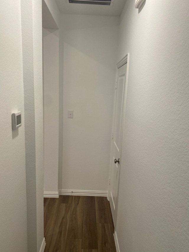 1613 Pine Valley Dr, Fort Worth, TX 76052 - hall featuring dark wood-style floors and baseboards